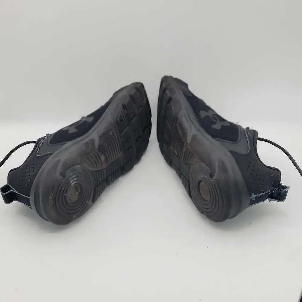 Under Armour Charged Assert 9 black Running boy's size 5.5y